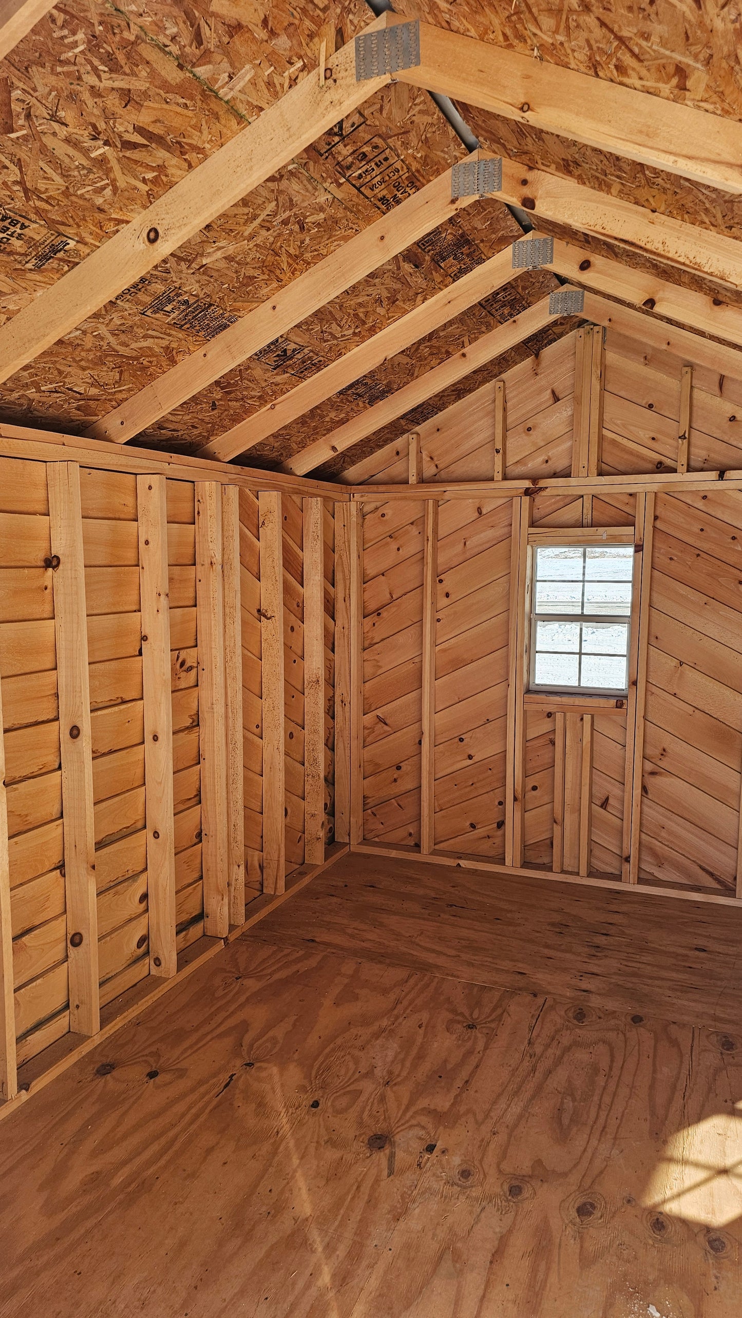 8×16 Cabin-Style Shed (8×12) with 4′ Porch – Black Roof – DIAG Siding