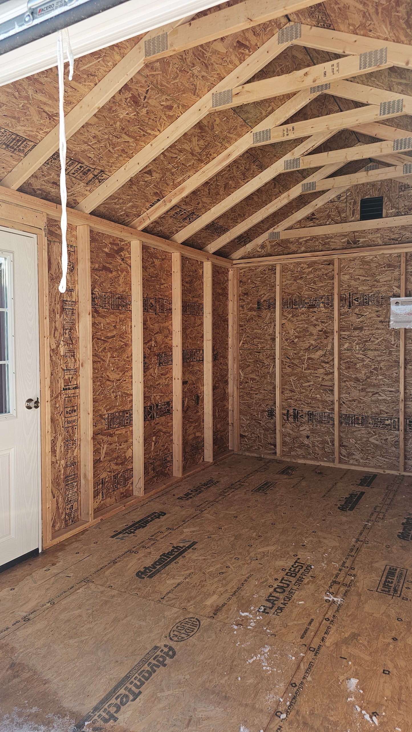 10×14 Steel Shed – 6′ Roll-Up Door & Side Entry with Glass