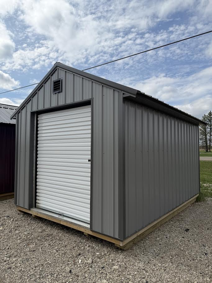 10×14 Steel Shed – 6′ Roll-Up Door & Side Entry with Glass*