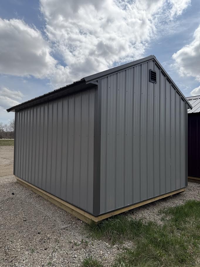 10×14 Steel Shed – 6′ Roll-Up Door & Side Entry with Glass*