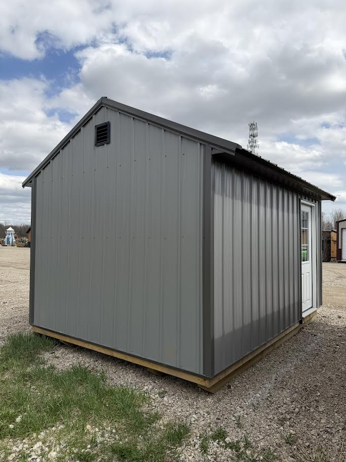 10×14 Steel Shed – 6′ Roll-Up Door & Side Entry with Glass*