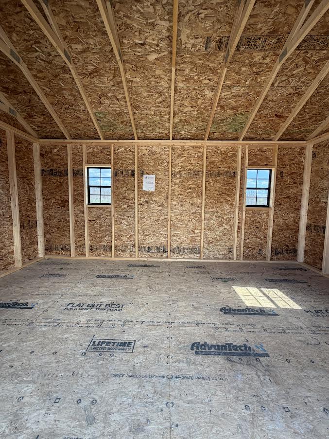 10' x 16' Amish-Built Steel Structure with Roll-Up Door, Windows & Modern Wainscoting*