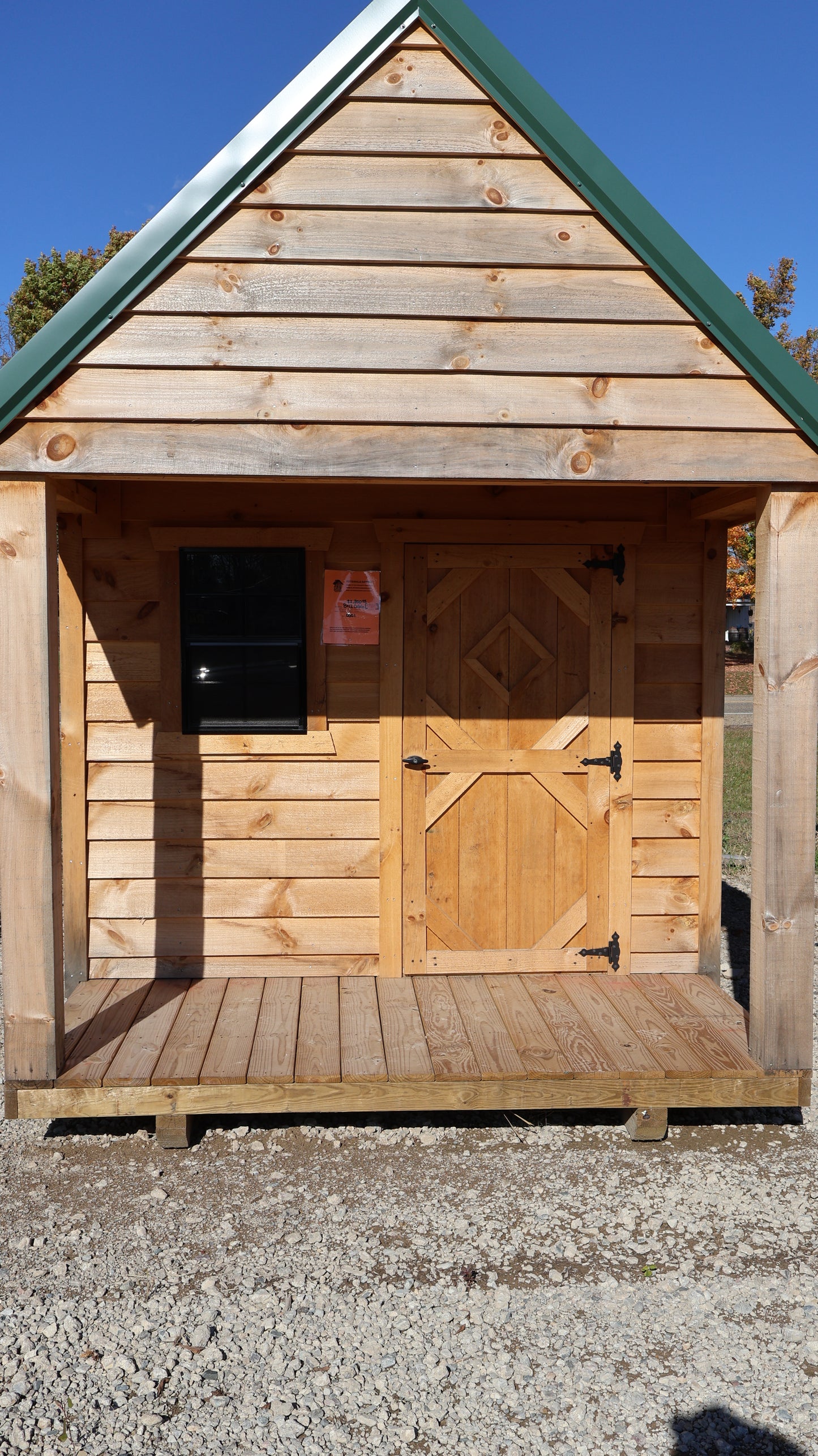 8×12 Rough Sawn Cabin with 8×8 Enclosed 4′ Porch – Green Steel Roof