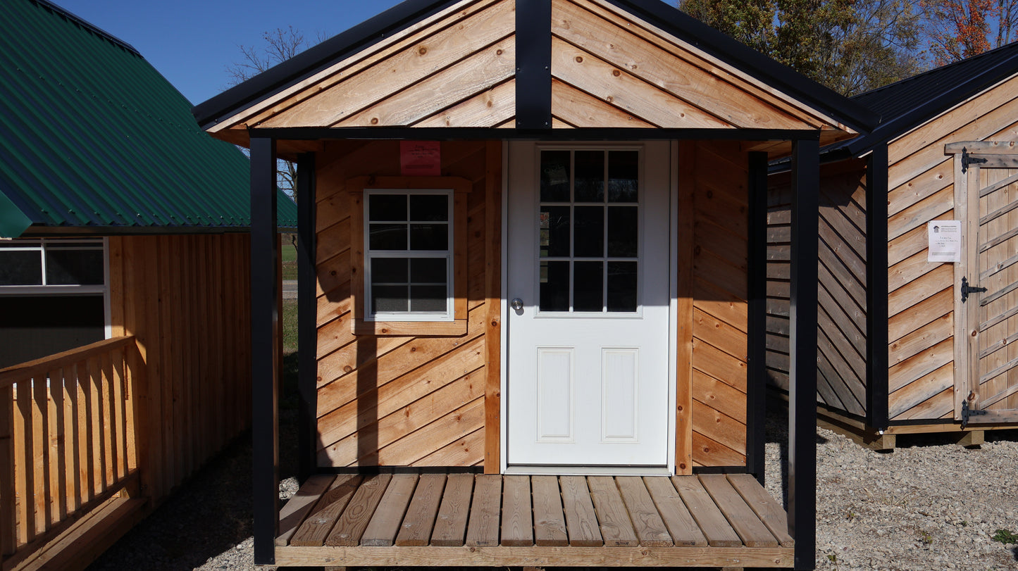 8×16 Cabin-Style Shed (8×12) with 4′ Porch – Black Roof – DIAG Siding