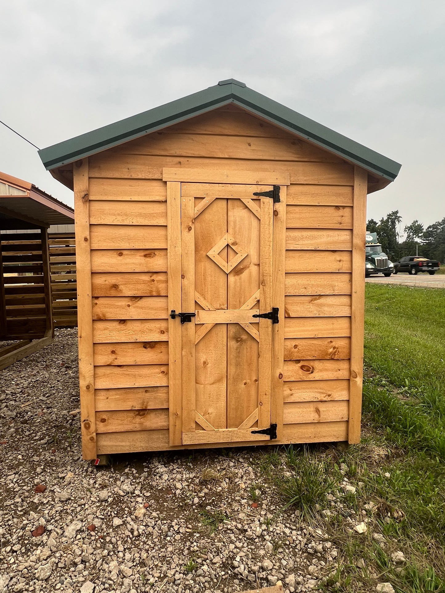 6x26 Rough Sawn Chicken Coop With Green Metal Roof