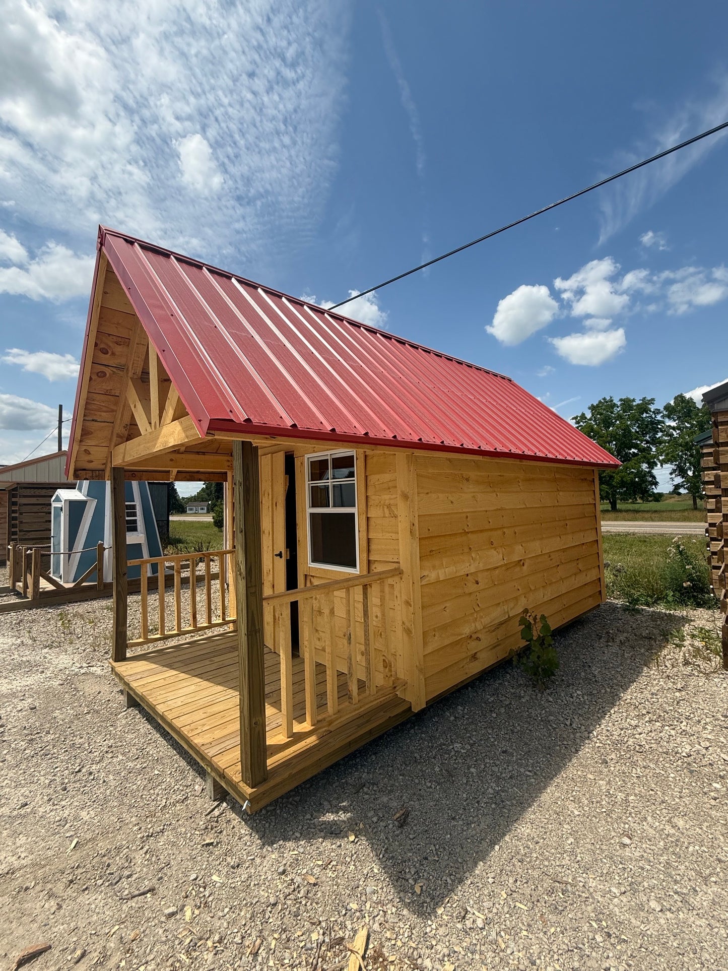 8x16 Amish Built Playhouse with a 4' Enclosed Porch, 3 Windows and Loft and Built in Features