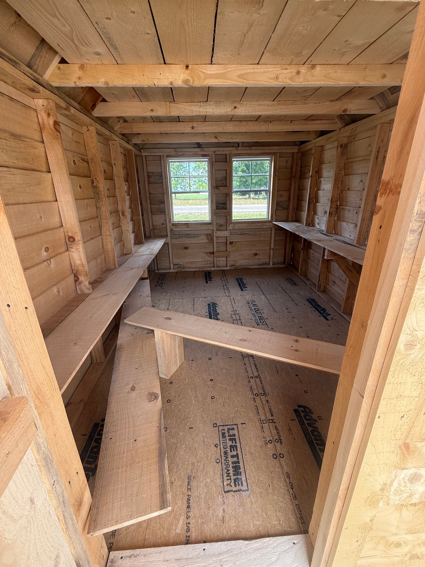 8x16 Amish Built Playhouse with a 4' Enclosed Porch, 3 Windows and Loft and Built in Features