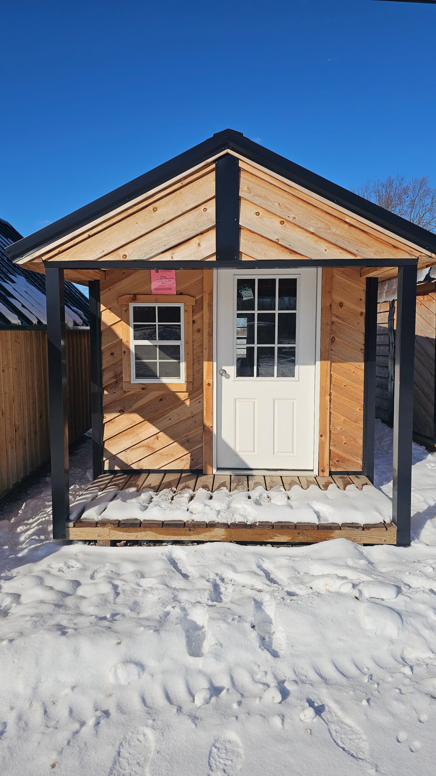 8×16 Cabin-Style Shed (8×12) with 4′ Porch – Black Roof – DIAG Siding