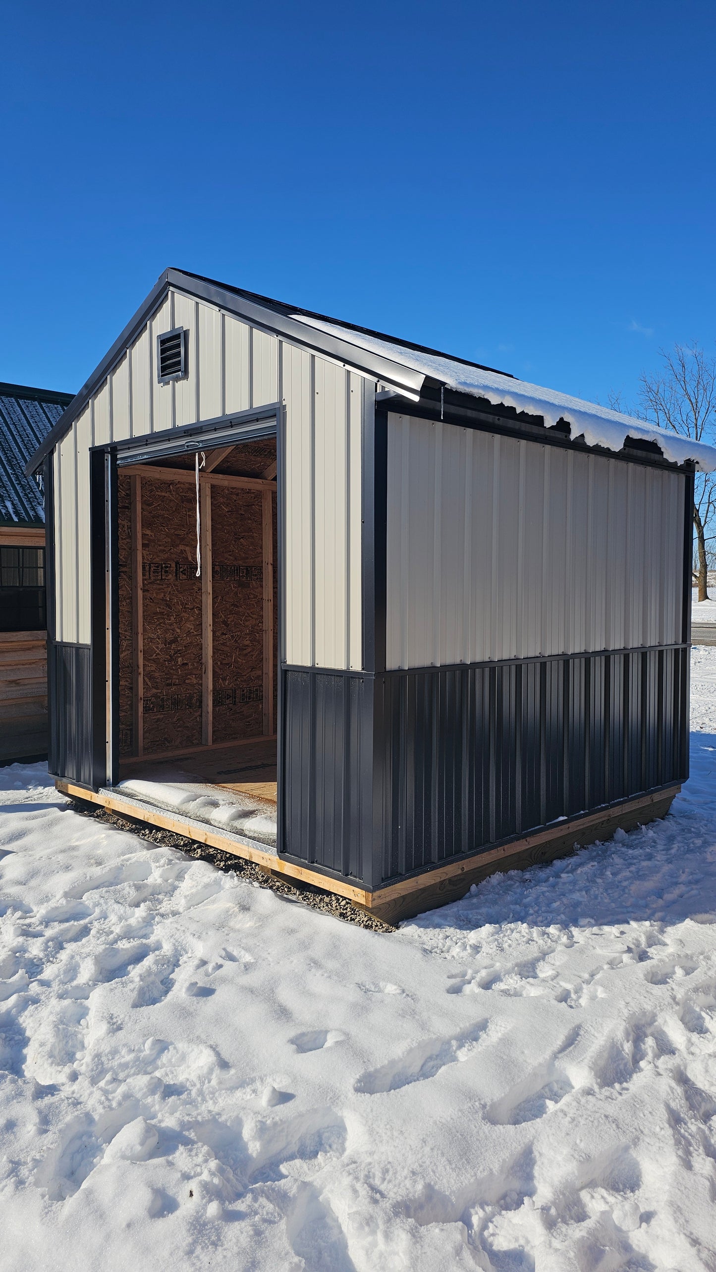 10×10 Shed with 6′ Roll-Up Door – Steel Construction & Wainscoting