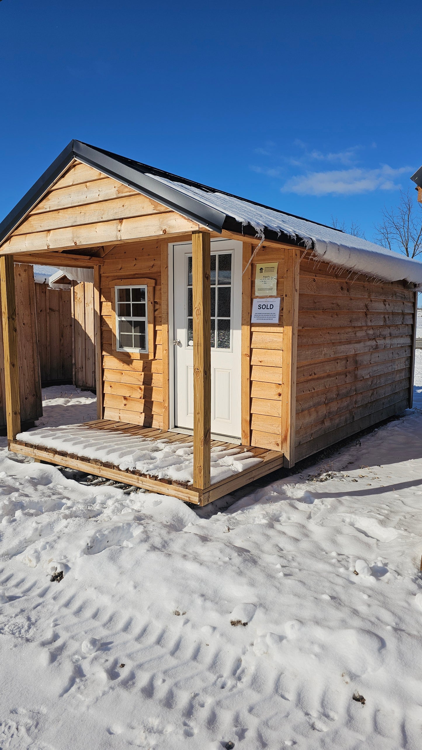 8×16 Cabin (8×12) with 4′ Porch – Black Roof – SKU 0006