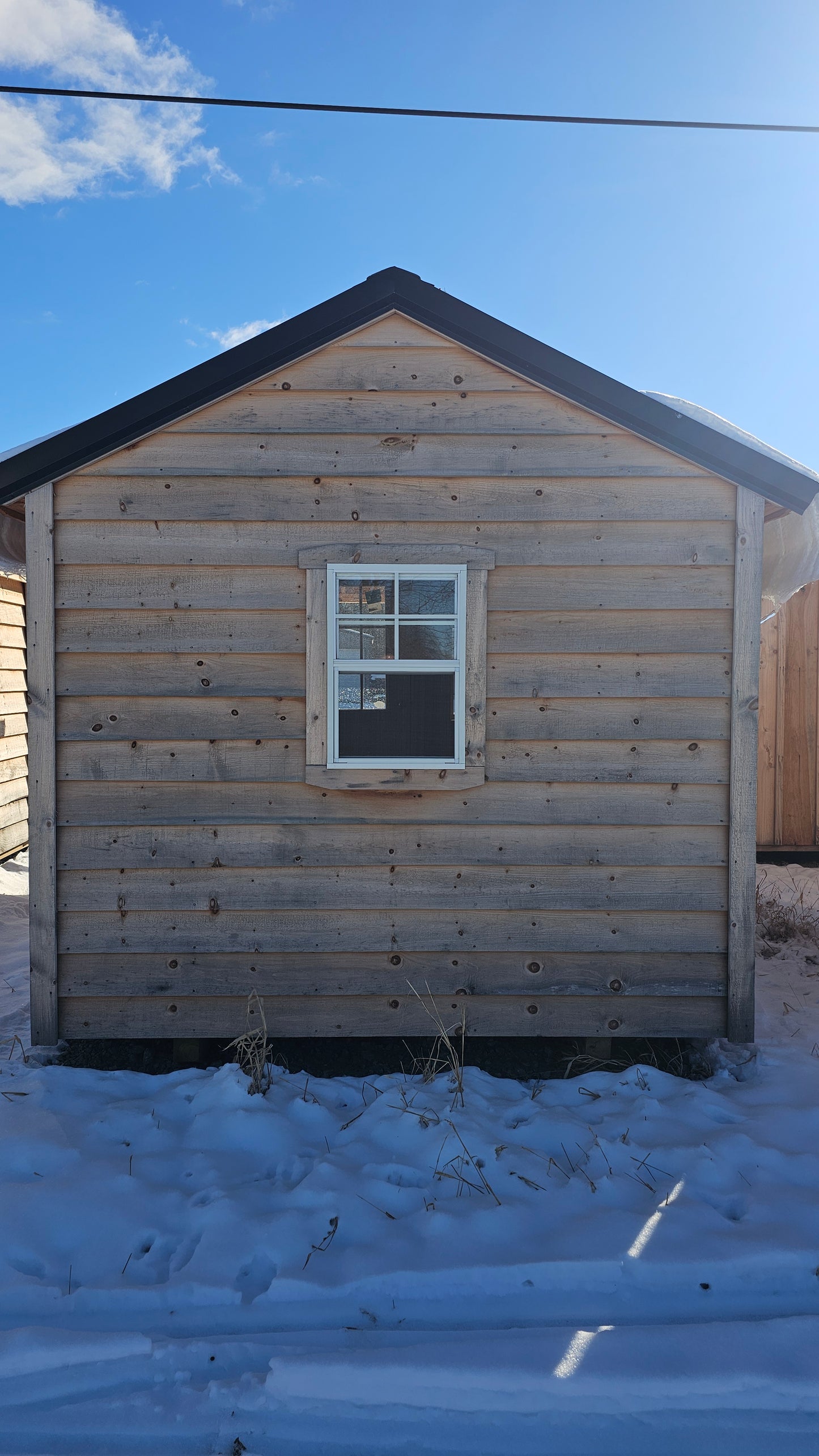 8×16 Cabin (8×12) with 4′ Porch – Black Roof – SKU 0006