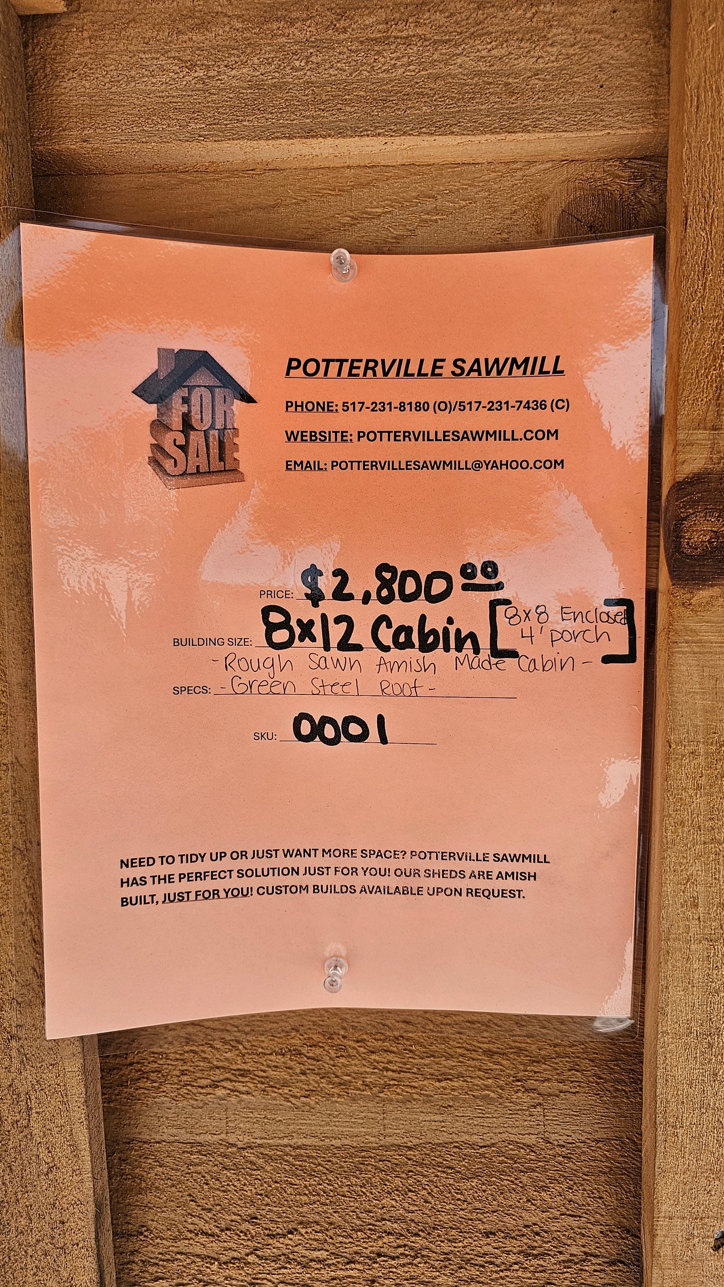 8×12 Rough Sawn Cabin with 8×8 Enclosed 4′ Porch – Green Steel Roof