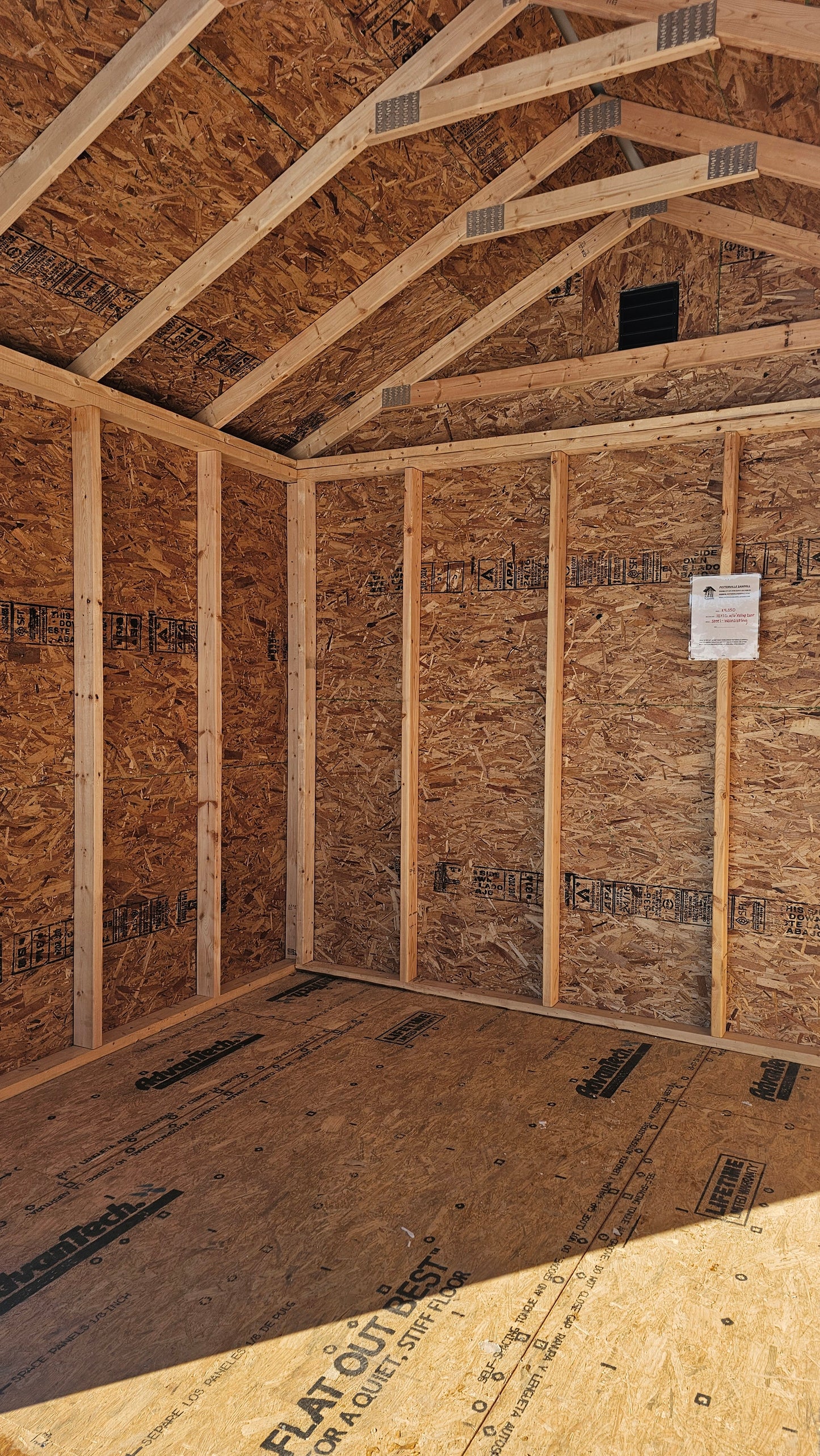 10×10 Shed with 6′ Roll-Up Door – Steel Construction & Wainscoting