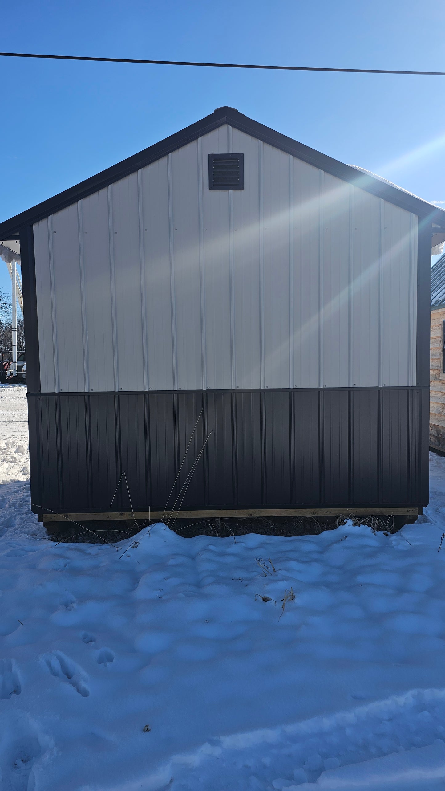 10×10 Shed with 6′ Roll-Up Door – Steel Construction & Wainscoting
