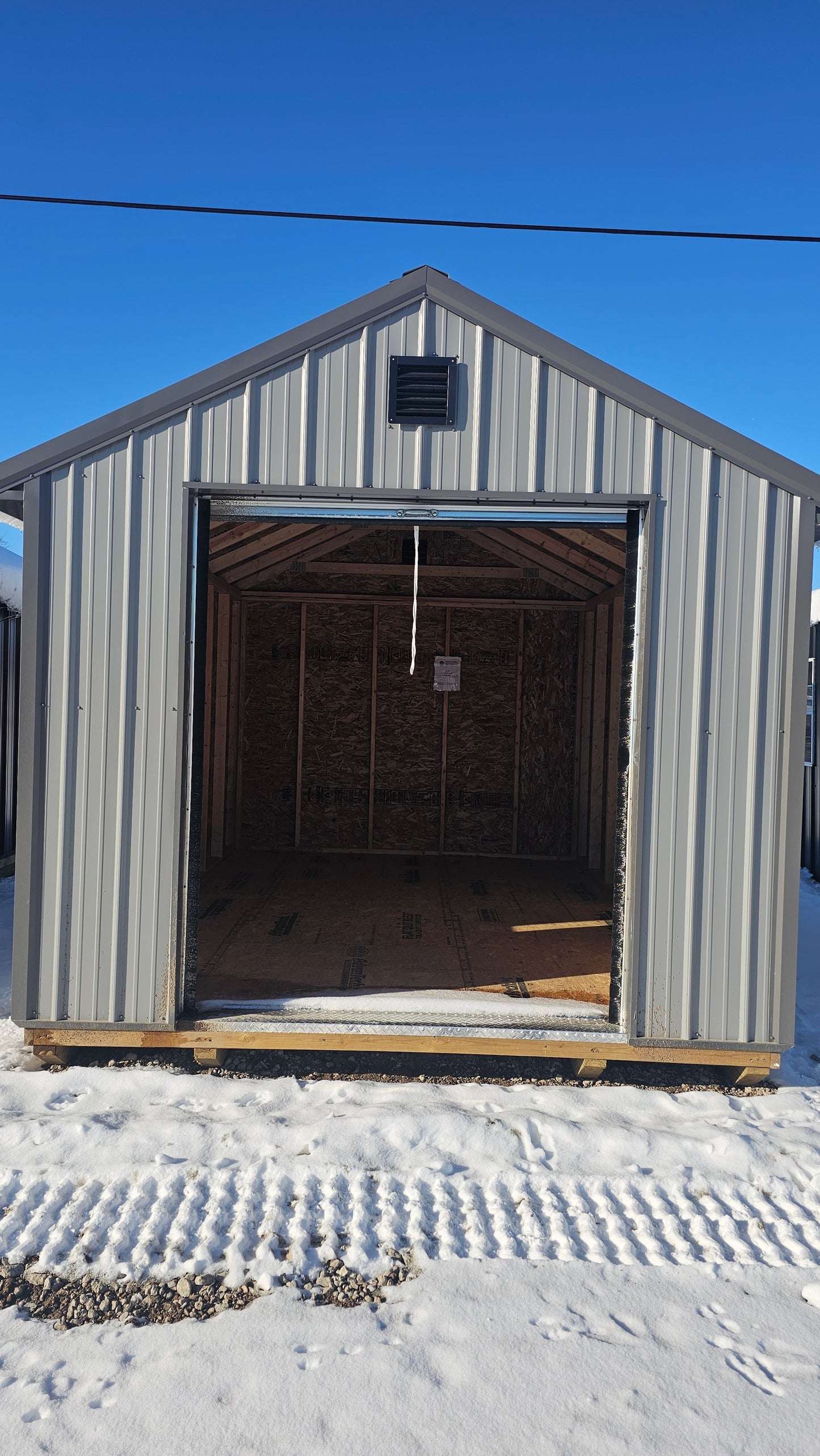 10×14 Steel Shed – 6′ Roll-Up Door & Side Entry with Glass