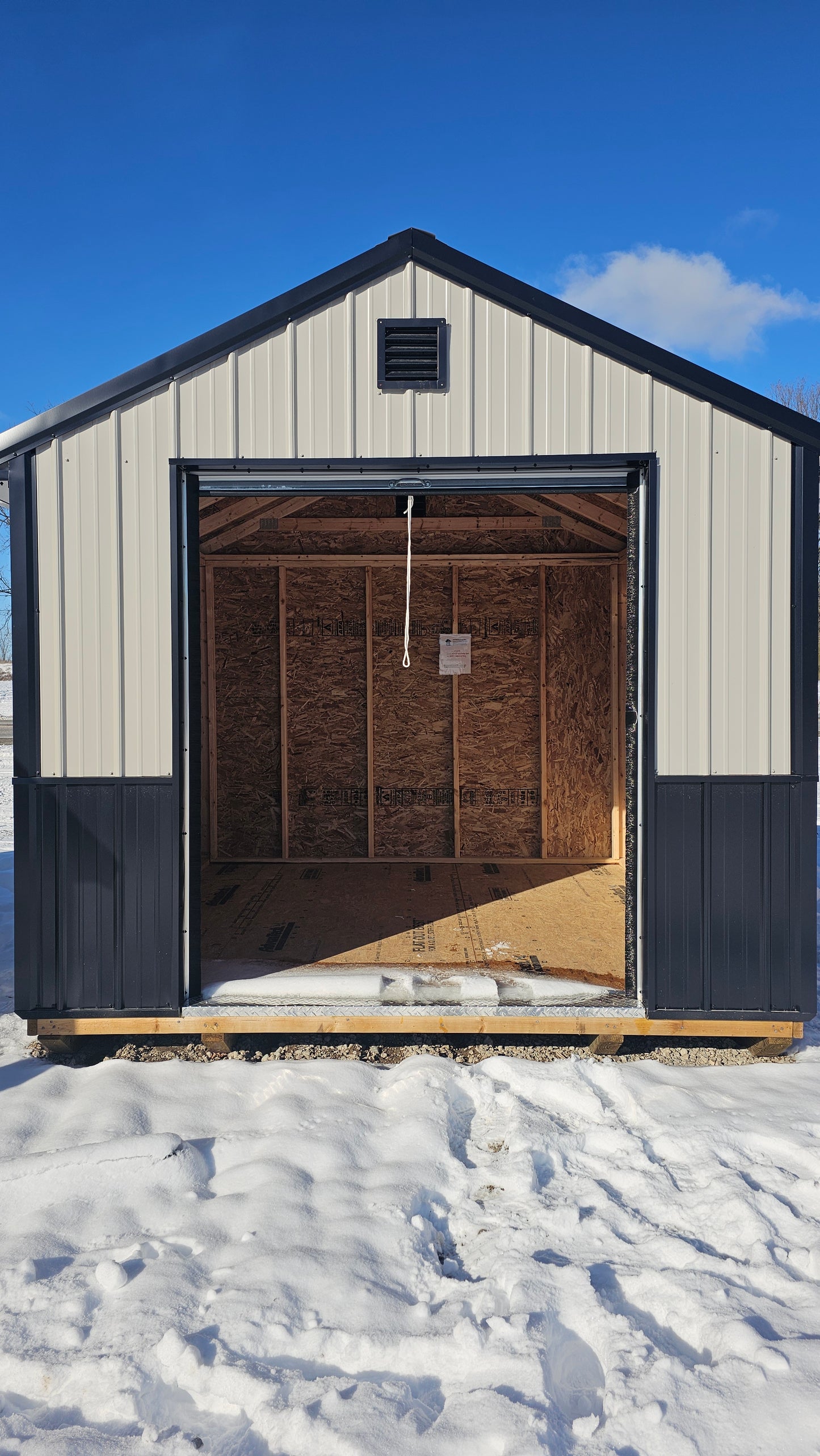 10×10 Shed with 6′ Roll-Up Door – Steel Construction & Wainscoting